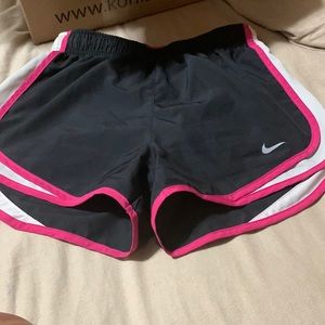 Black and pink Nike shorts